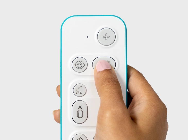 Close-up of a finger pressing the sleep button on Nubo for one touch logging